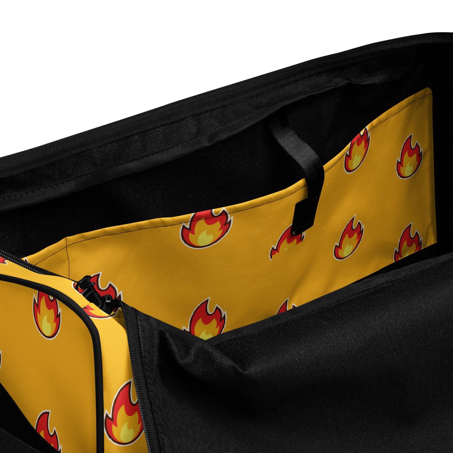 Too cool for school yellow gold duffle bag with "fire" emoji design all over it. Black handles and strap make colors pop.