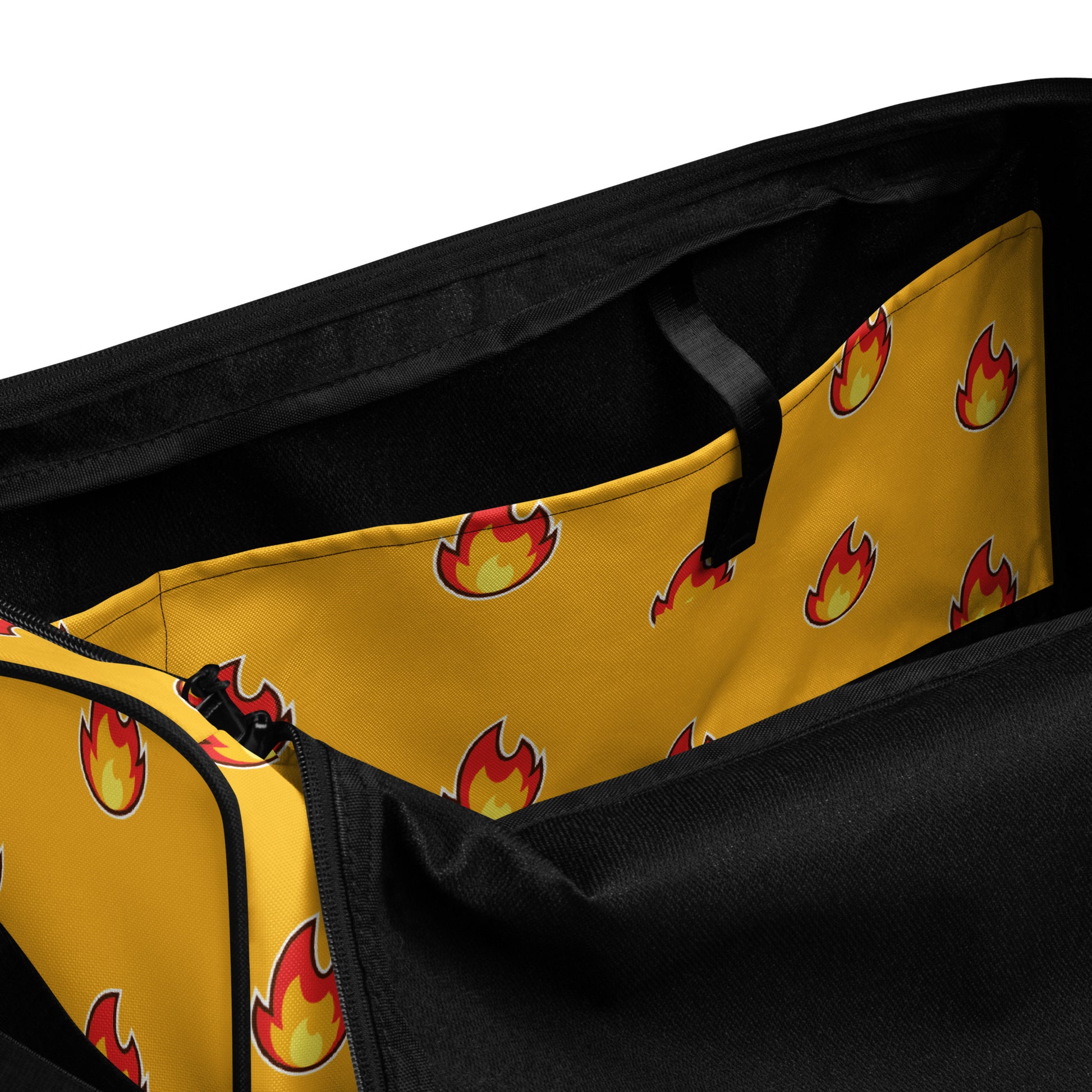 Too cool for school yellow gold duffle bag with "fire" emoji design all over it. Black handles and strap make colors pop.