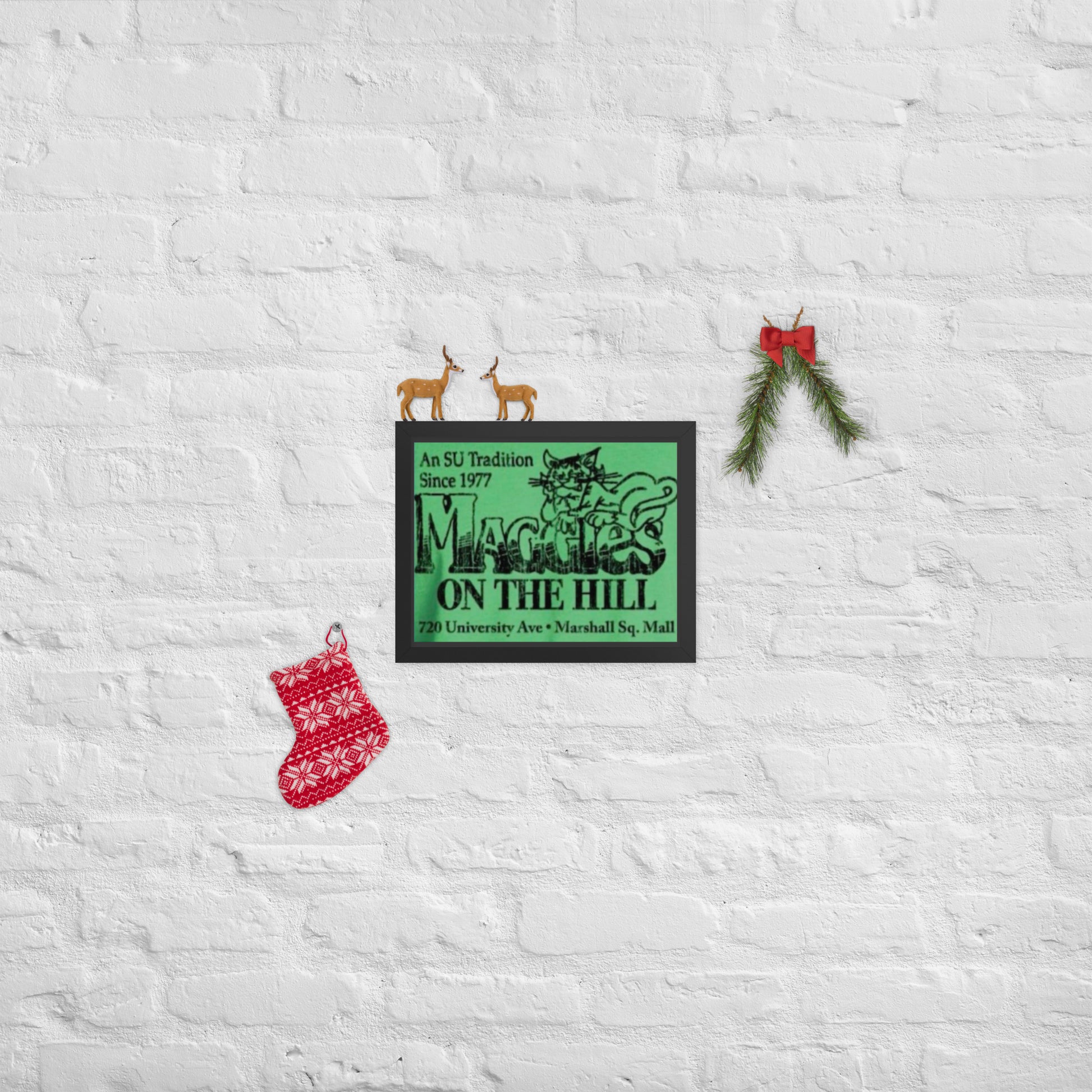 Black framed green college bar logo that says 'Maggie's on the Hill'