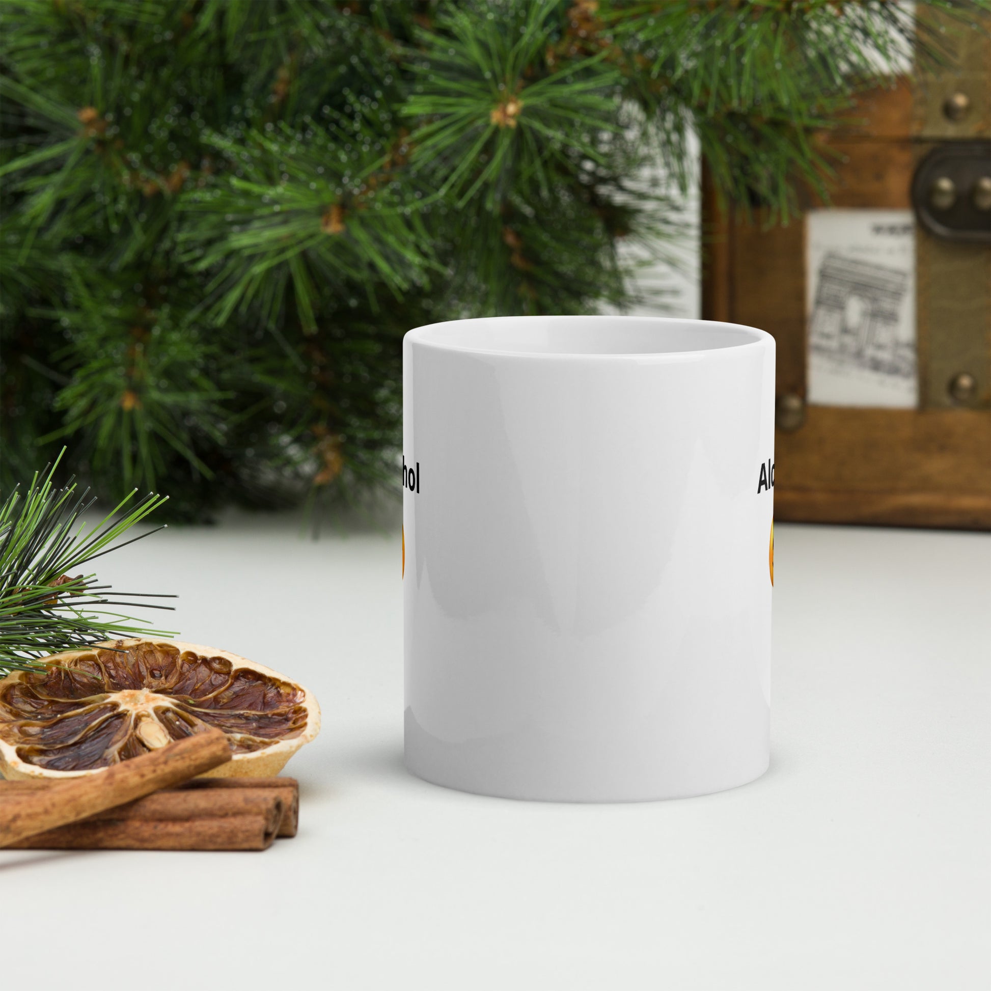 White ceramic mug with a happy face says 'Alcohol'