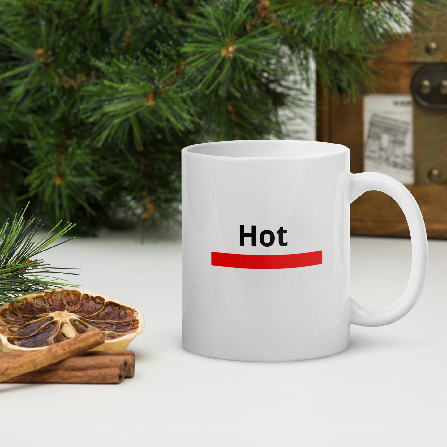 White mug that says 'Hot'