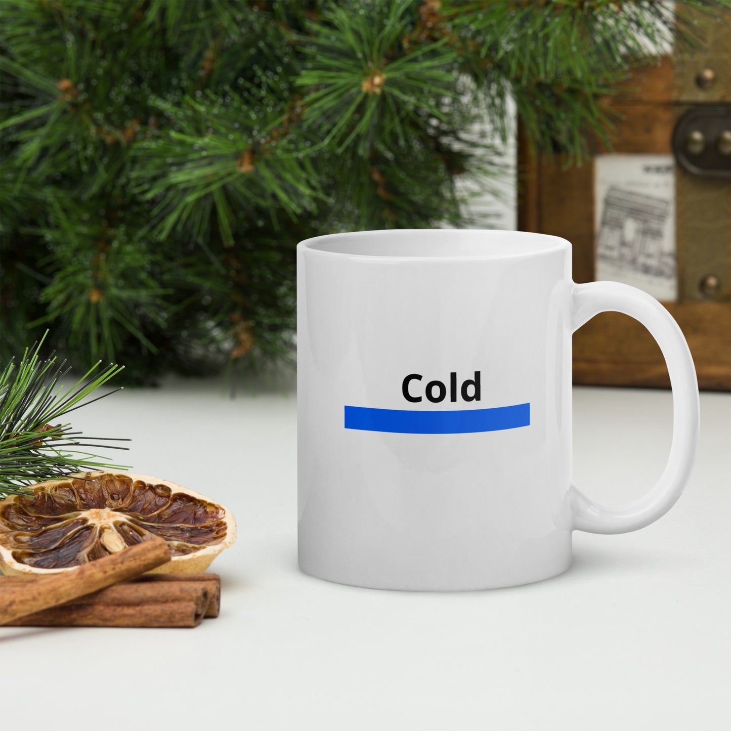 White mug that says 'Cold' on both sides