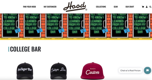 Top shelf embroidered black hats that say "College Bar" 