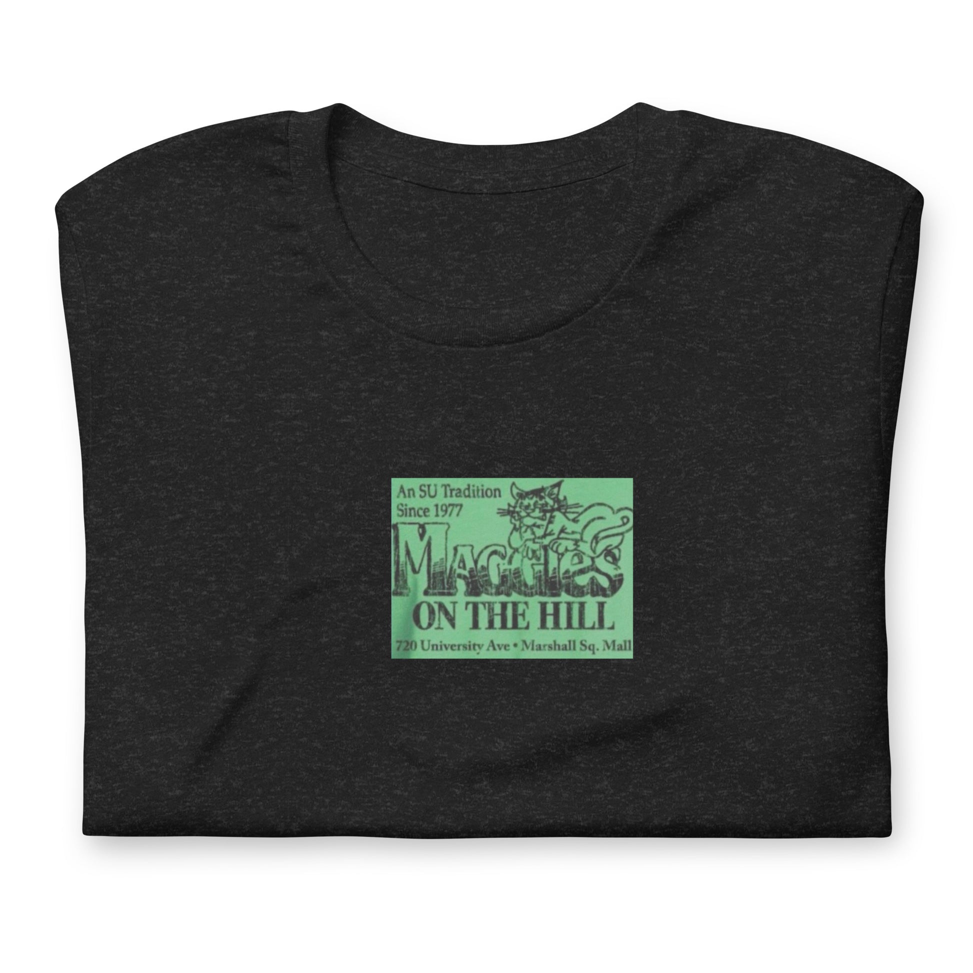 Black unisex graphic tee shirt that says 'Maggie's on the Hill' in green and black in the center