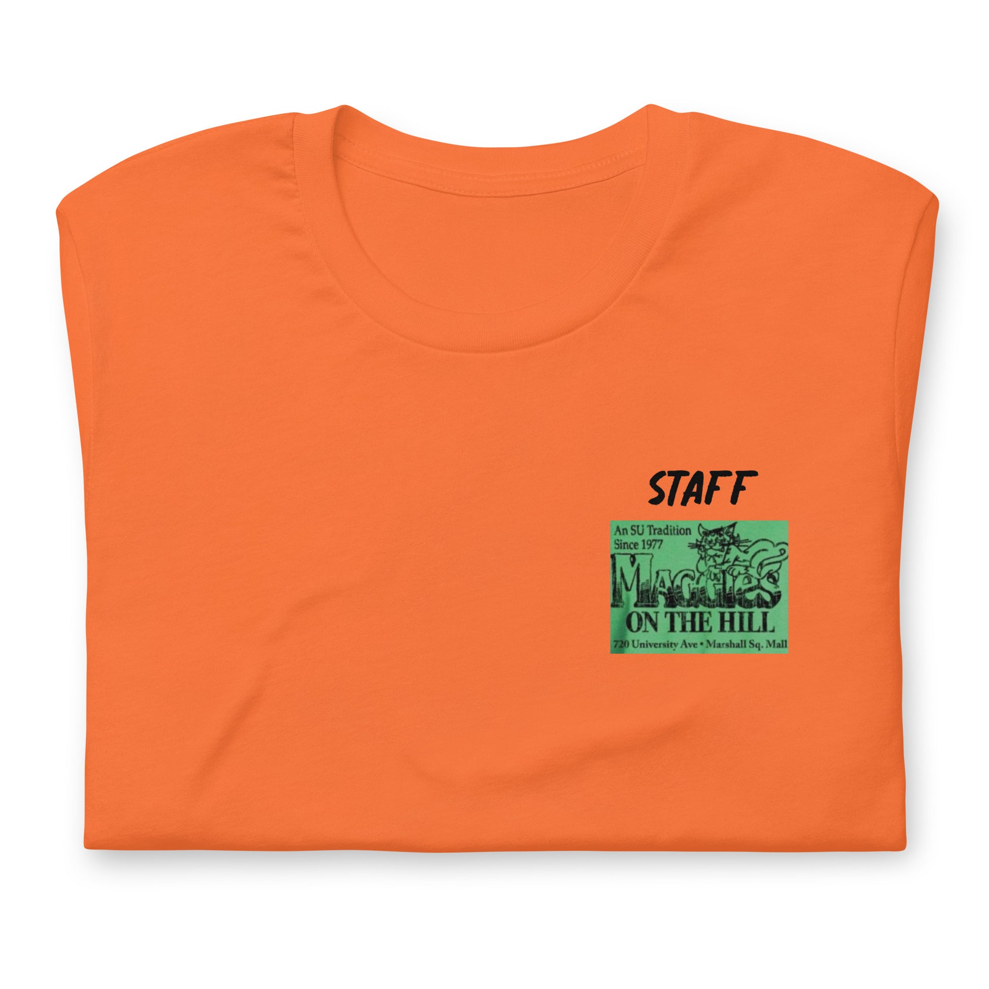 Orange tee shirt that says 'Maggie's on the Hill - Staff' in green and black