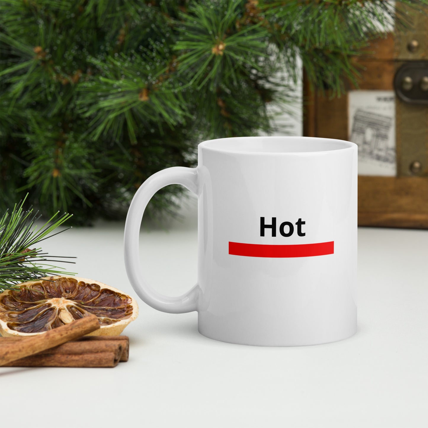 White mug that says 'Hot' with a red warning bar