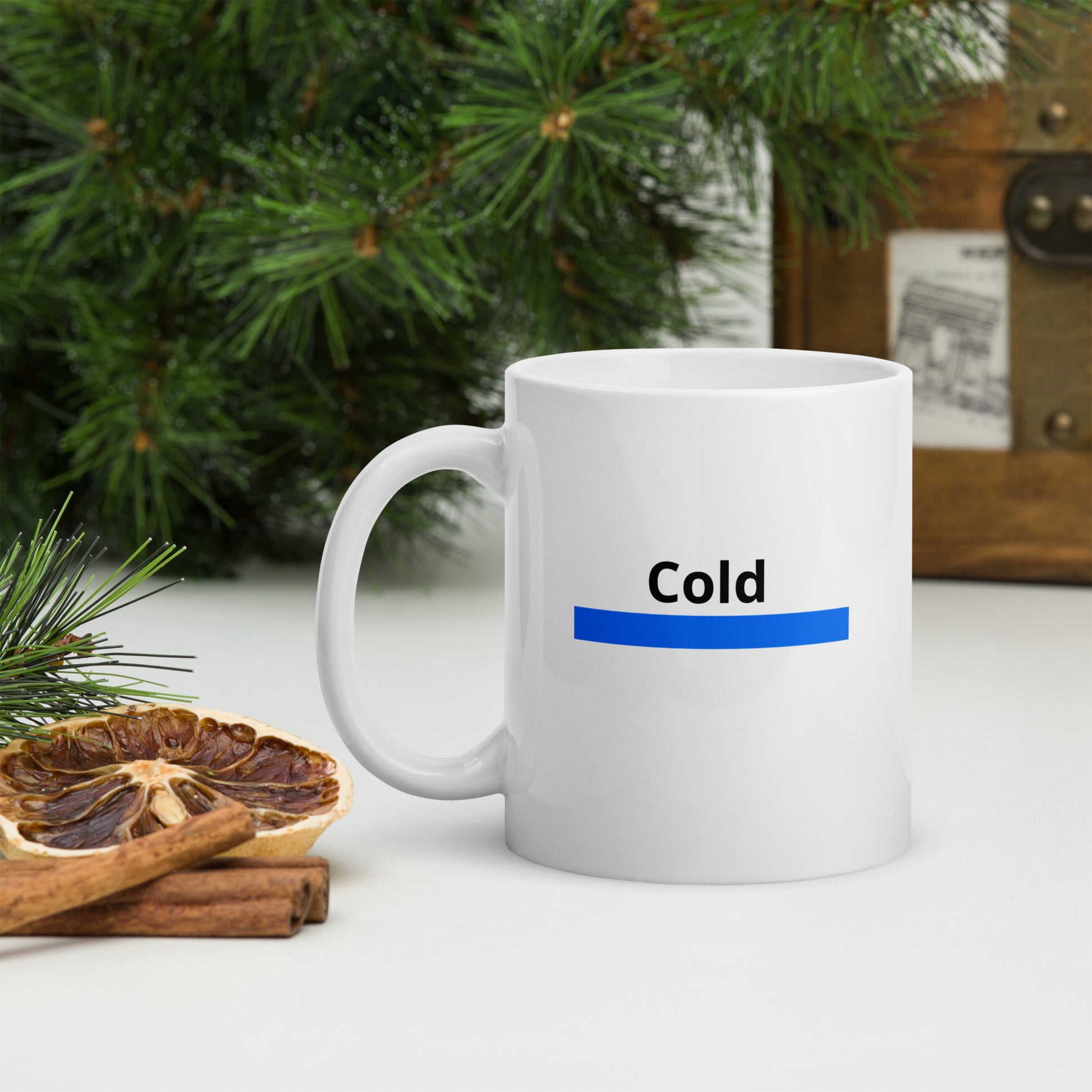 White mug with a bar of blue says 'Cold' on both sides